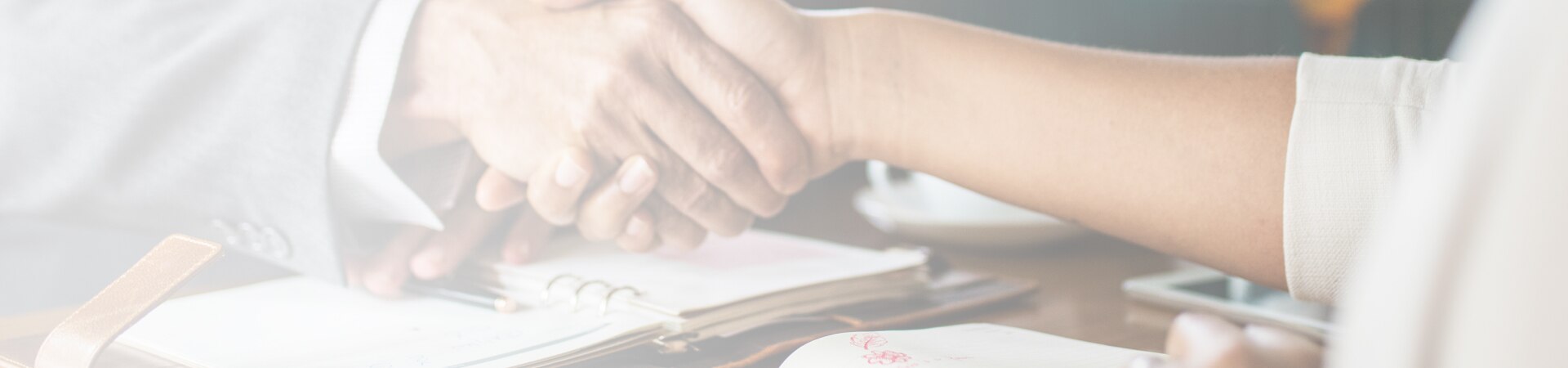 attorney and client shaking hands